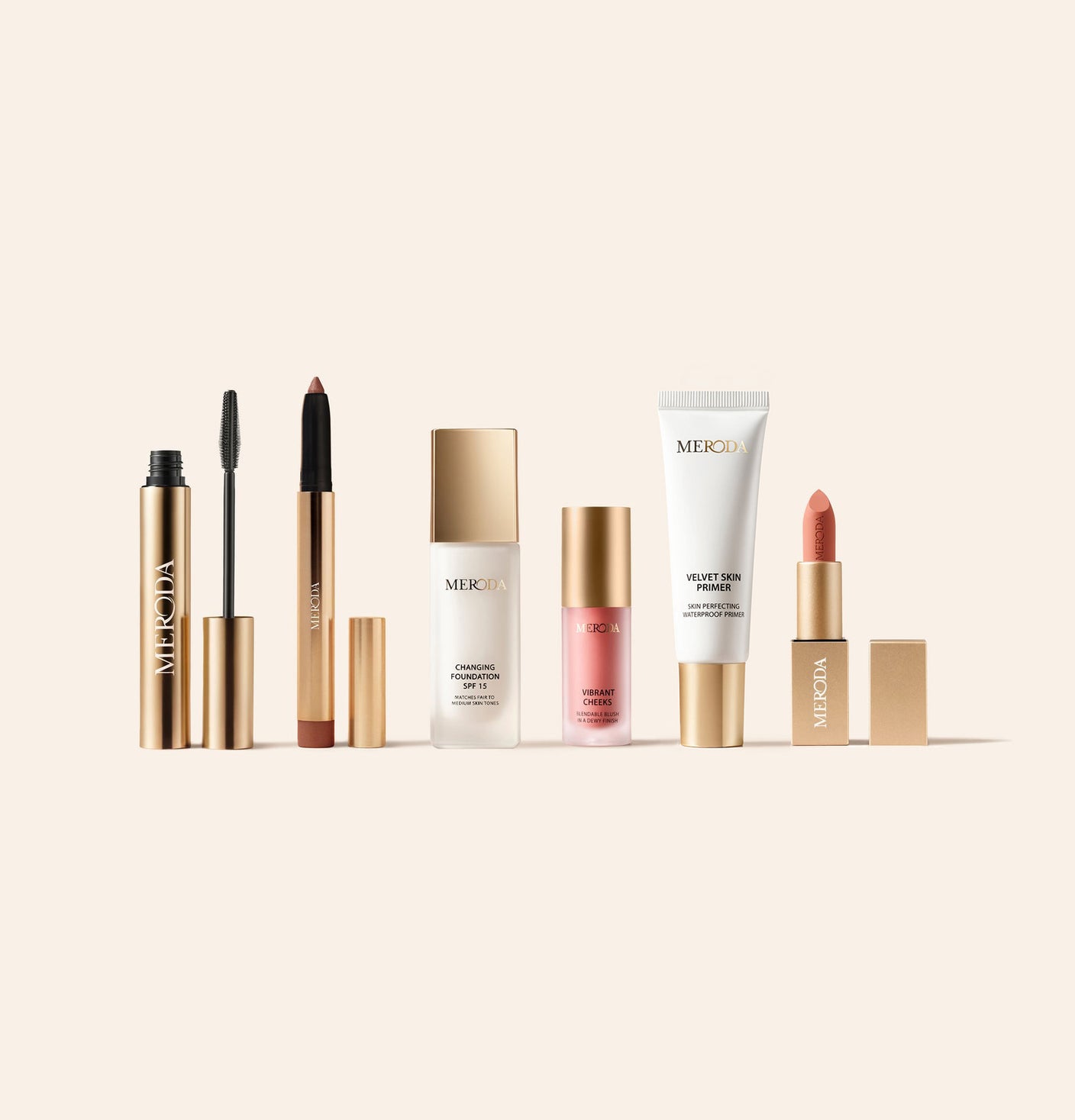 Endless Summer Bundle mit Changing Foundation SPF 15, Gilded Lashes Mascara, Velvet Dream Lipstick, Vibrant Cheeks Blush, Eye Perfecting Shimmer Stick und Velvet Skin Primer auf hellem Hintergrund